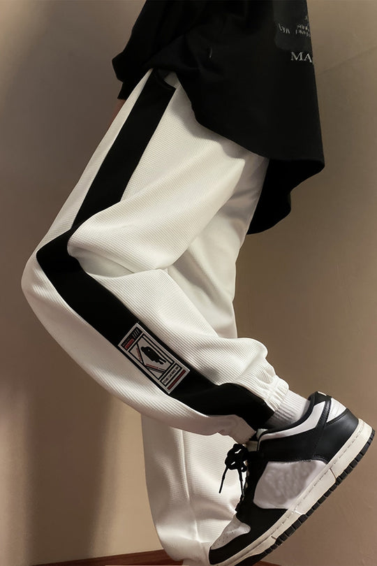 STRIDE TRACKPANTS