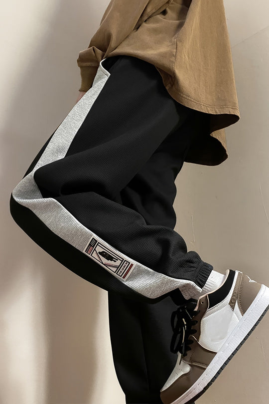 STRIDE TRACKPANTS