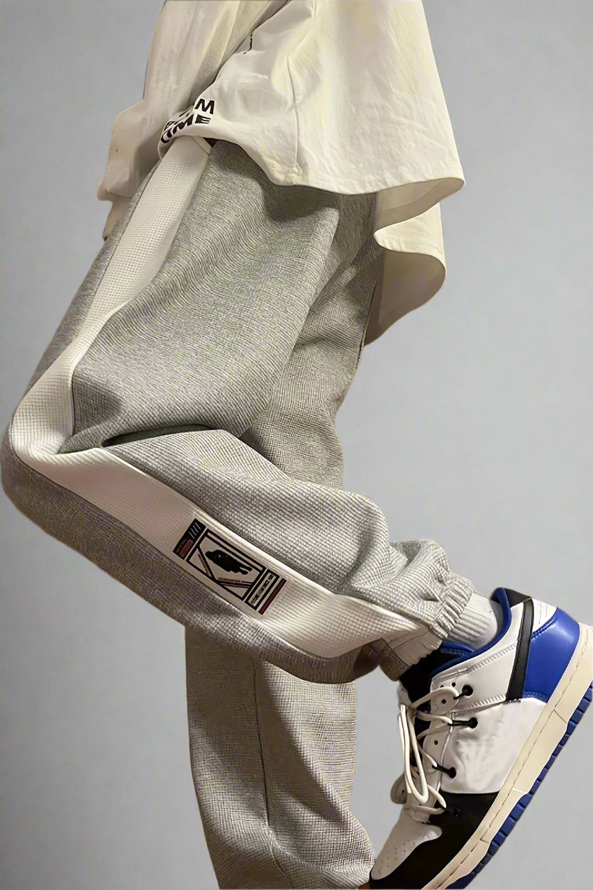 STRIDE TRACKPANTS