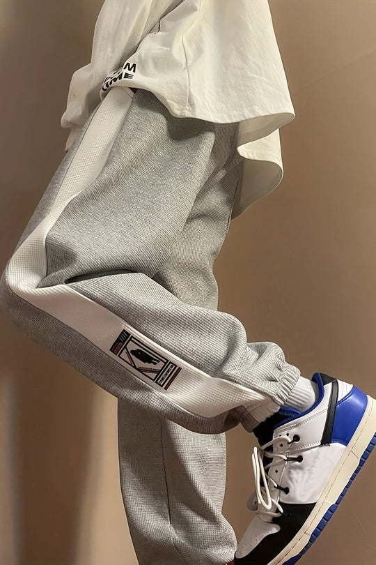 STRIDE TRACKPANTS