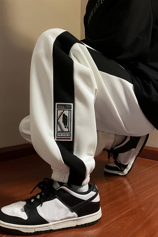 STRIDE TRACKPANTS